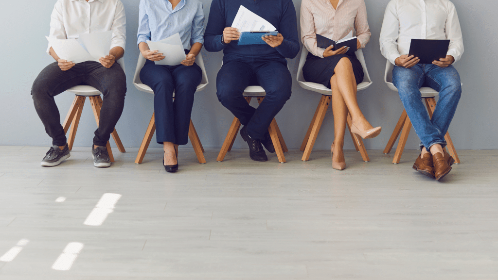 A group sits in chairs.