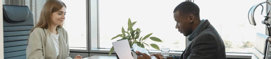 Two people meeting in an office.