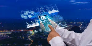 Hand interacting with virtual AI interface over a cityscape, symbolising the integration of technology, flexibility, and innovation in the future of work.