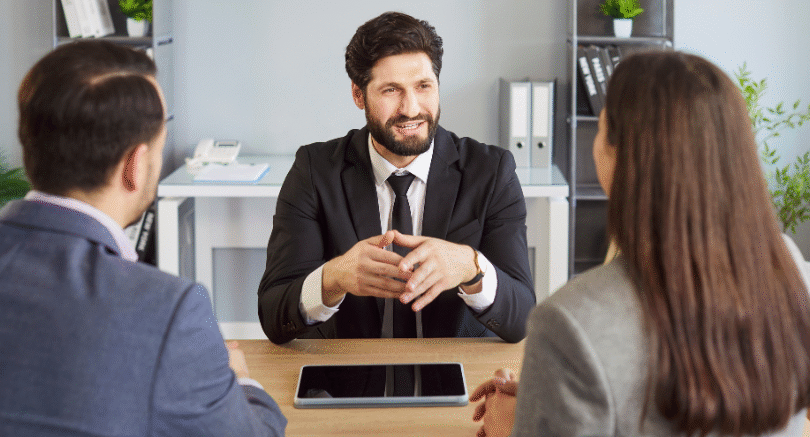 SME hiring discussion in a modern office, representing recruitment and how SMEs compete for talent in 2026.