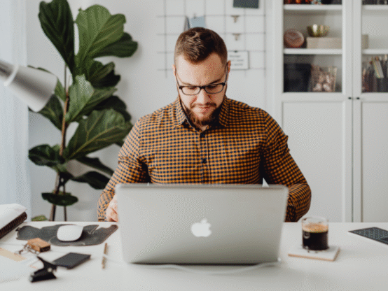 Employee working from home on laptop illustrating Victoria work from home laws employers must comply with