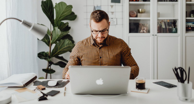 Employee working from home on laptop illustrating Victoria work from home laws employers must comply with