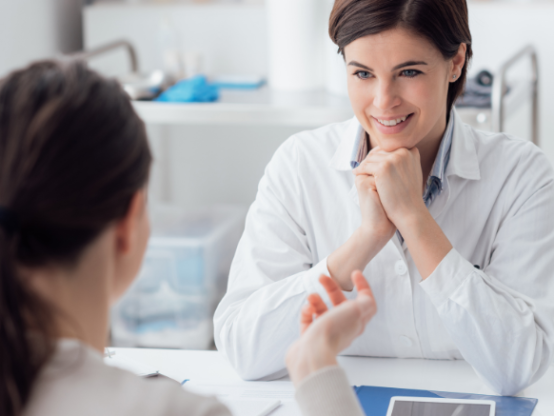 Employee discussing medical leave and return-to-work plan with healthcare professional