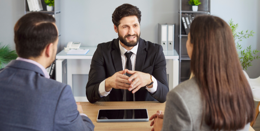 Manager discussing employee performance improvement plan in a workplace meeting